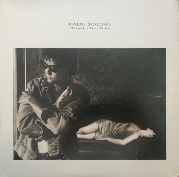 Paul Young : Between Two Fires (LP, Album, Car)